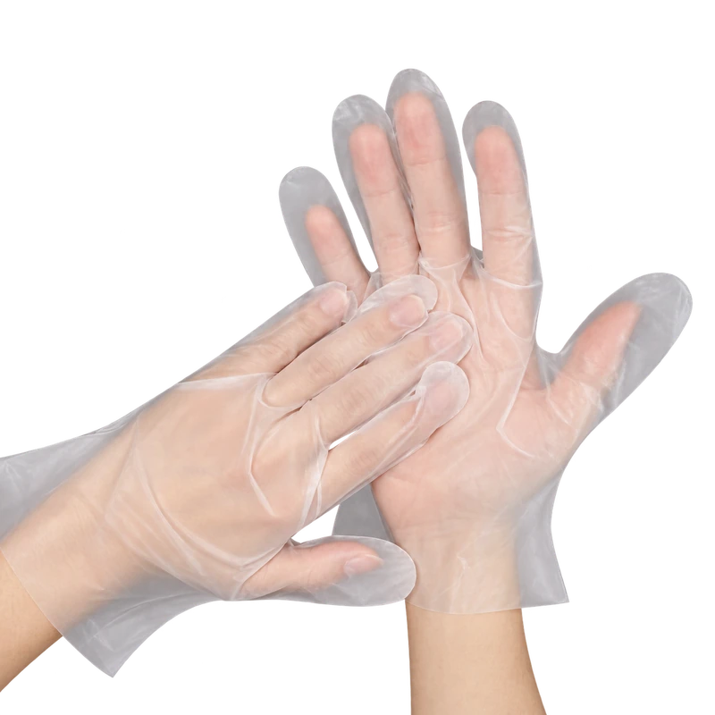 Clear loose-fitting gloves with one hand resting across an open palm