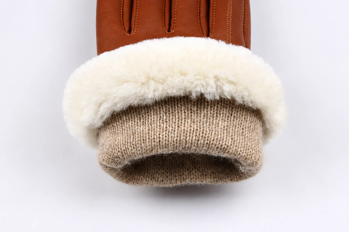 Brown glove cuff with white fluffy trim and a ribbed inner cuff