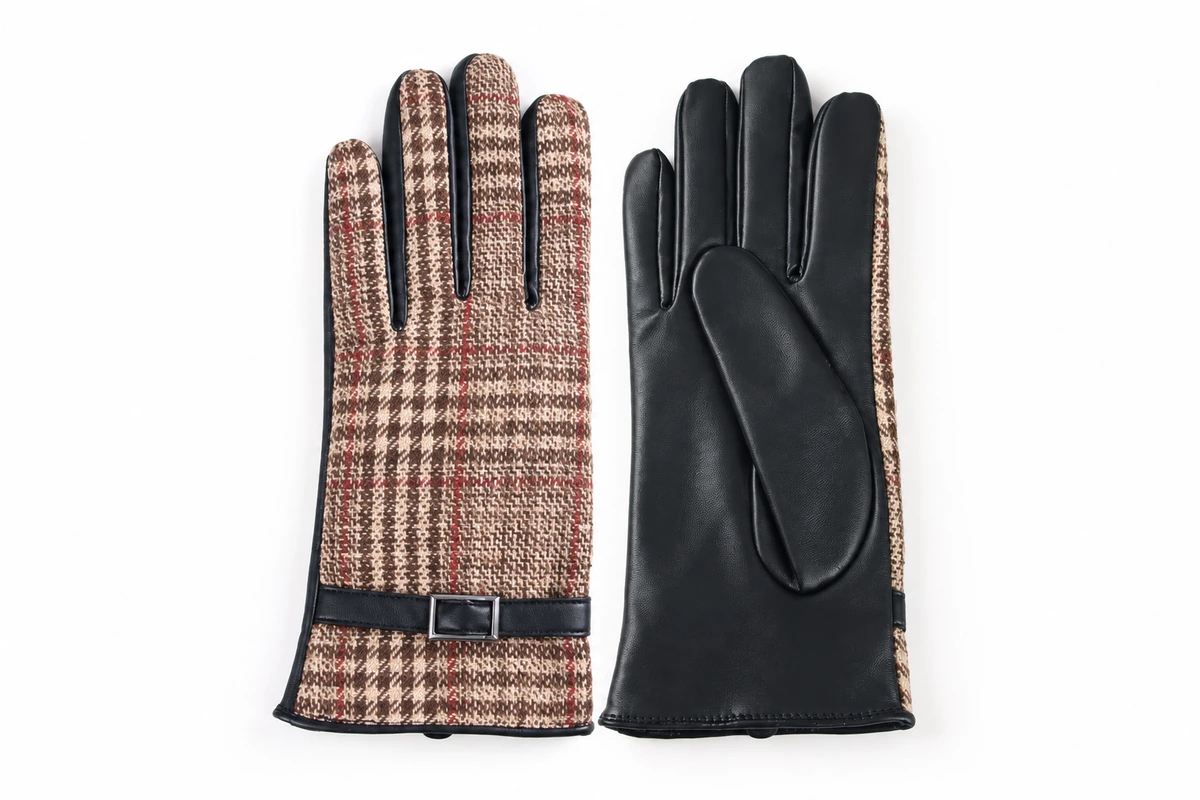 Gloves with houndstooth backs, black palms, and slim cuff straps