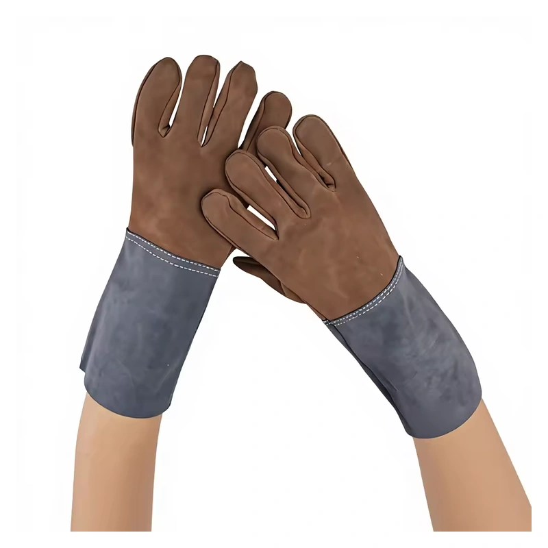 Hands wearing brown leather gloves with long gray cuffs