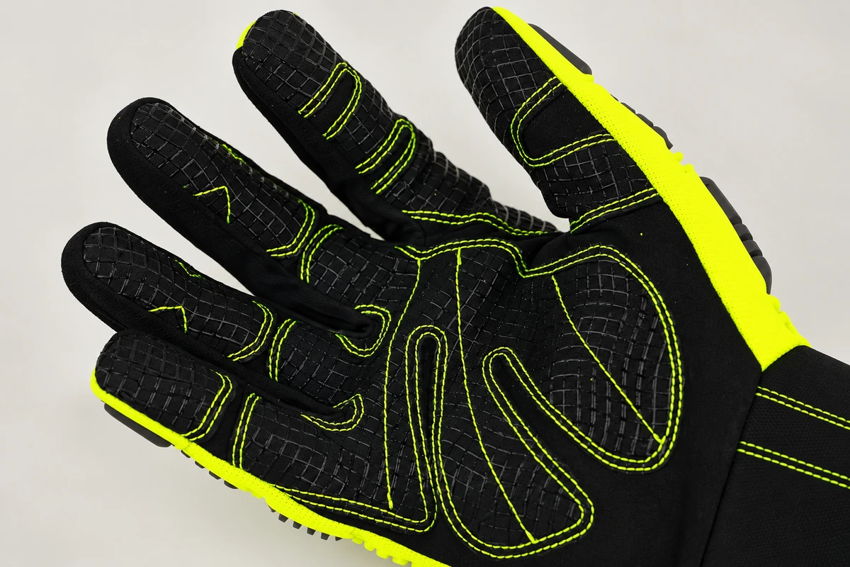 Black glove palm with lime stitching and reinforced contact zones