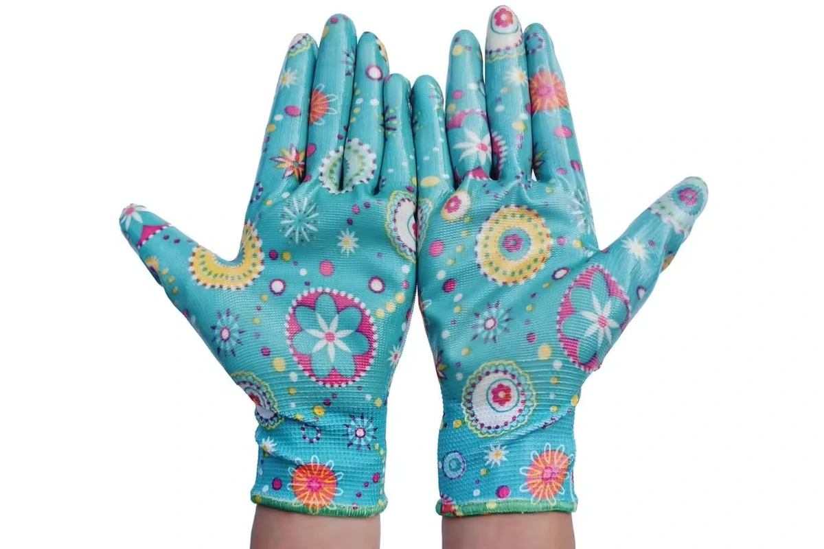 Turquoise gardening gloves with multicolored circular and floral patterns