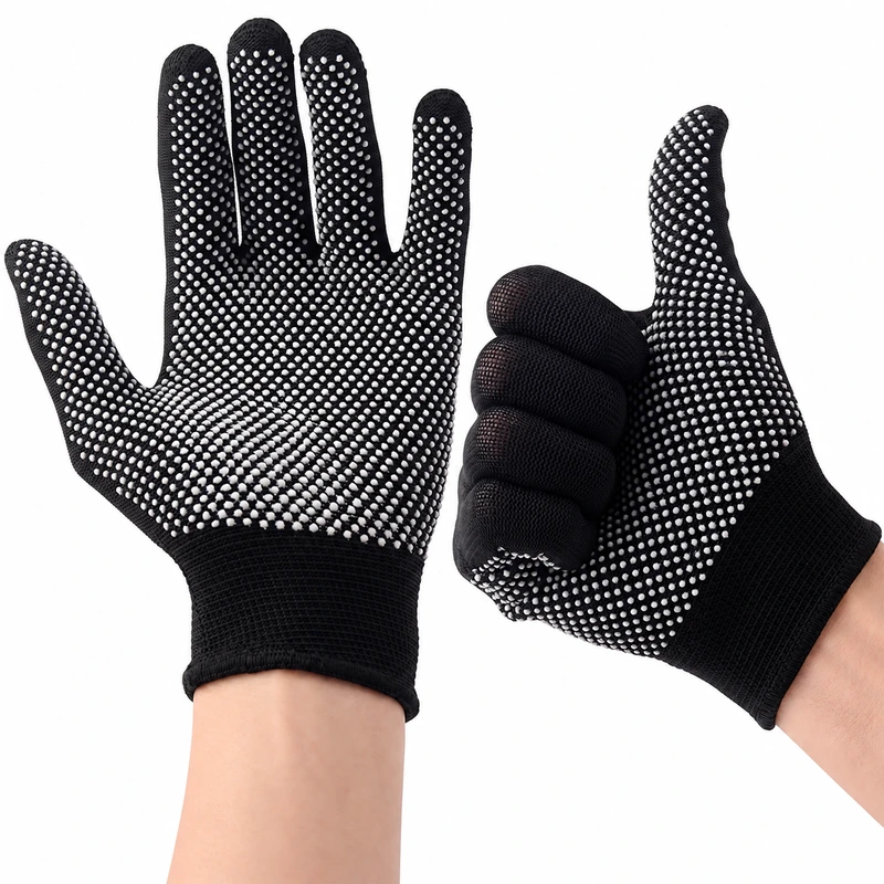 Black knitted gloves with white grip dots worn on both hands