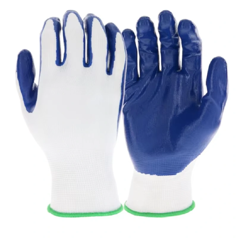 White knit gloves showing blue coated palms and white backs