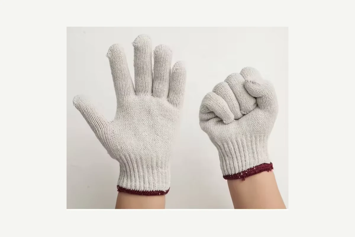 Cream knit gloves with burgundy cuff edges on open and closed hands