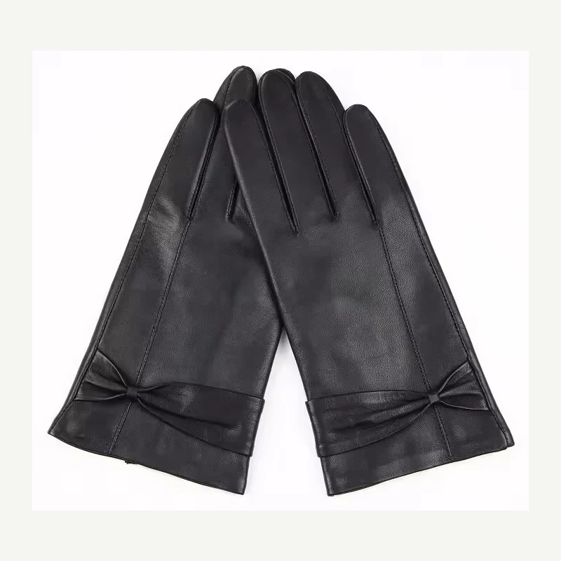 Black leather fashion gloves displayed as a pair