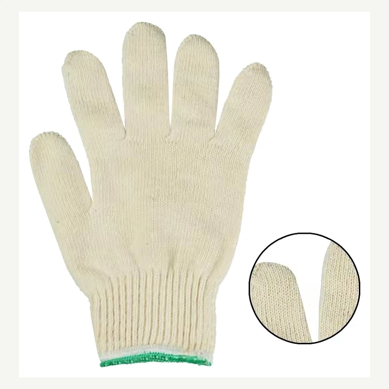Cream knit glove with a green-edged cuff and an inset stitch detail