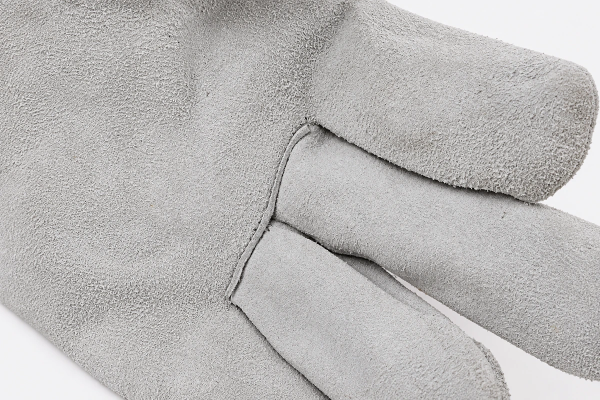 Gray leather thumb seam with matching stitching