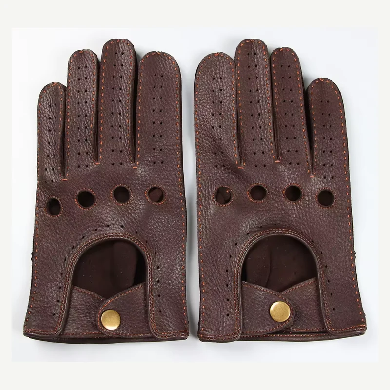 Brown leather driving gloves with perforations and snap wrist straps