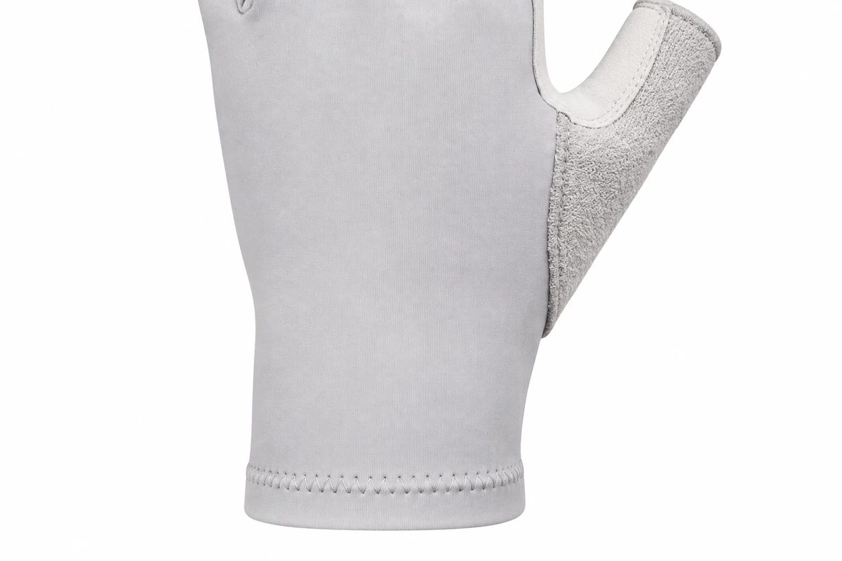 Plain light gray fabric at the back of a fishing glove wrist