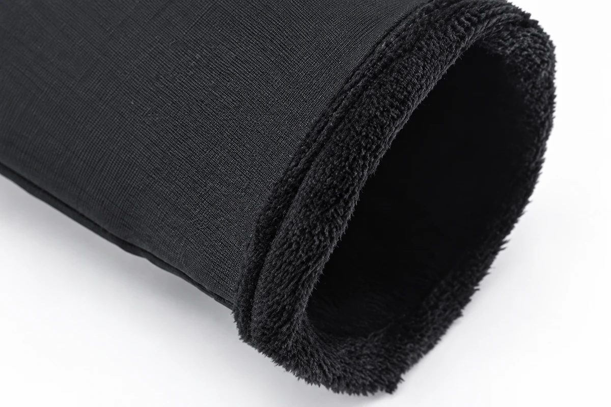 Soft fleece lining around a black glove cuff opening