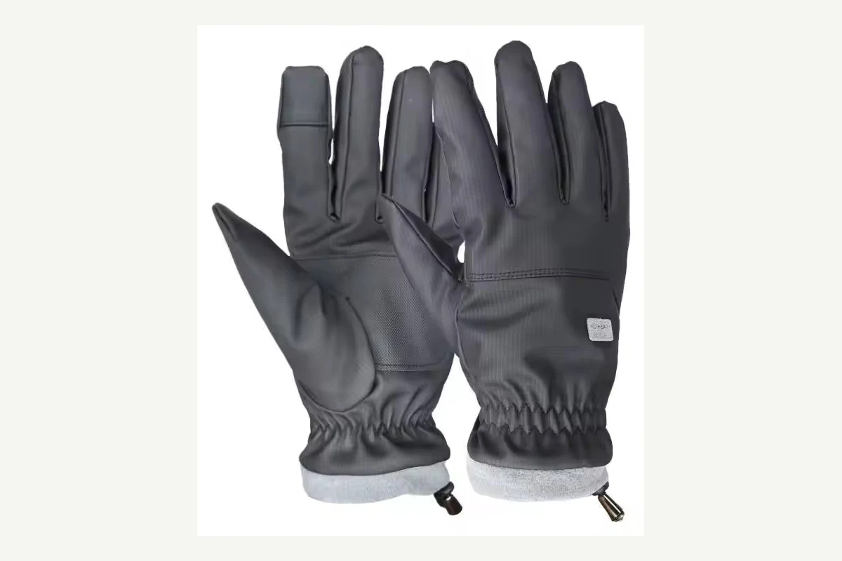 Gray gloves with gathered wrists, drawcord cuffs and a small white label