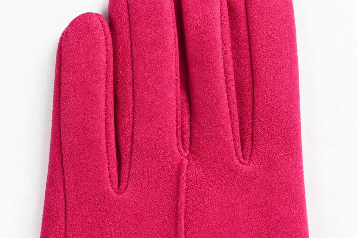 Plain pink fleece glove back with stitched finger lines