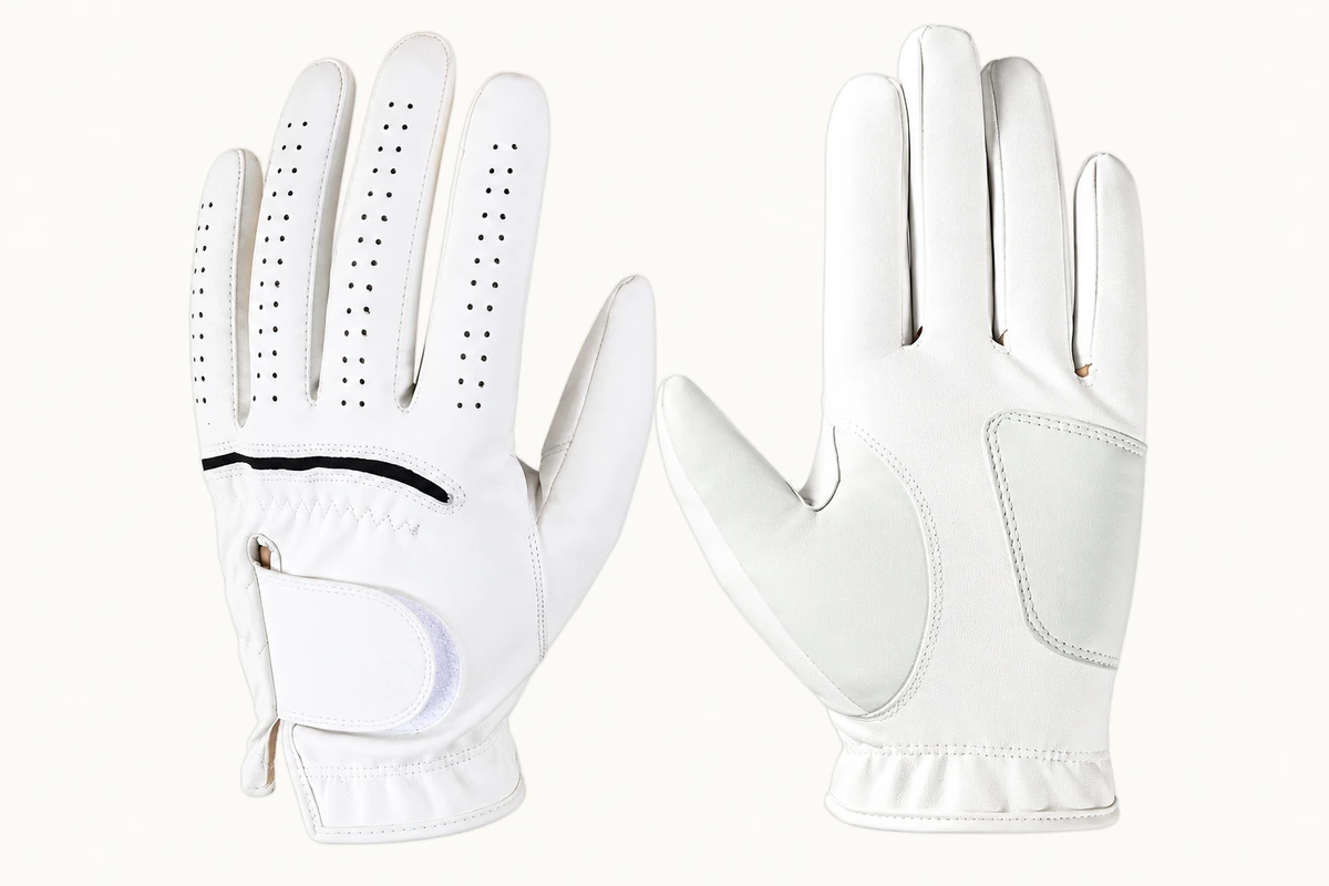 White golf gloves showing perforated back and plain palm