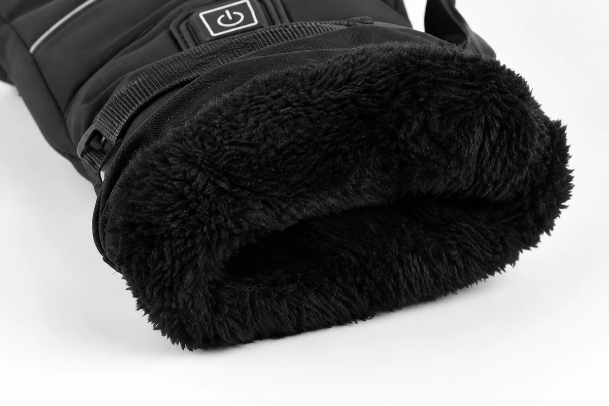 Soft black lining inside an open heated glove cuff