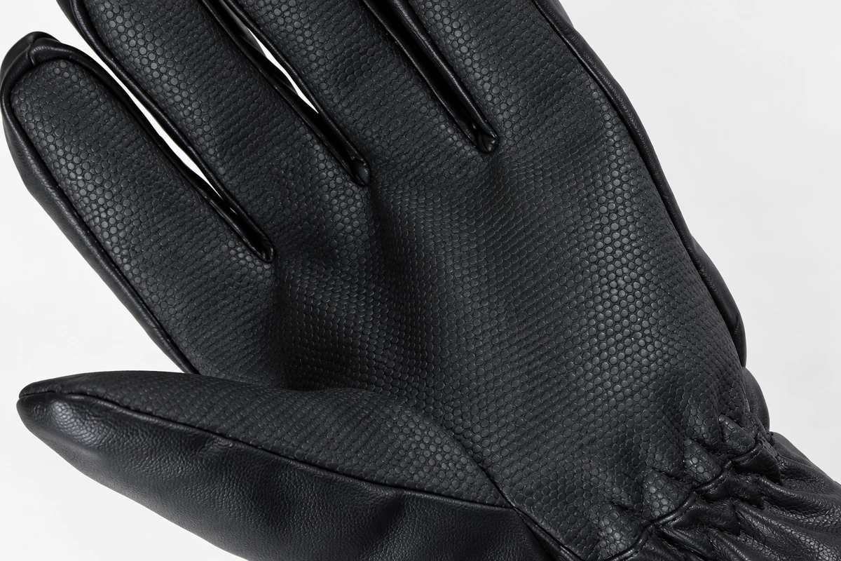 Textured palm and finger seams on a black heated glove