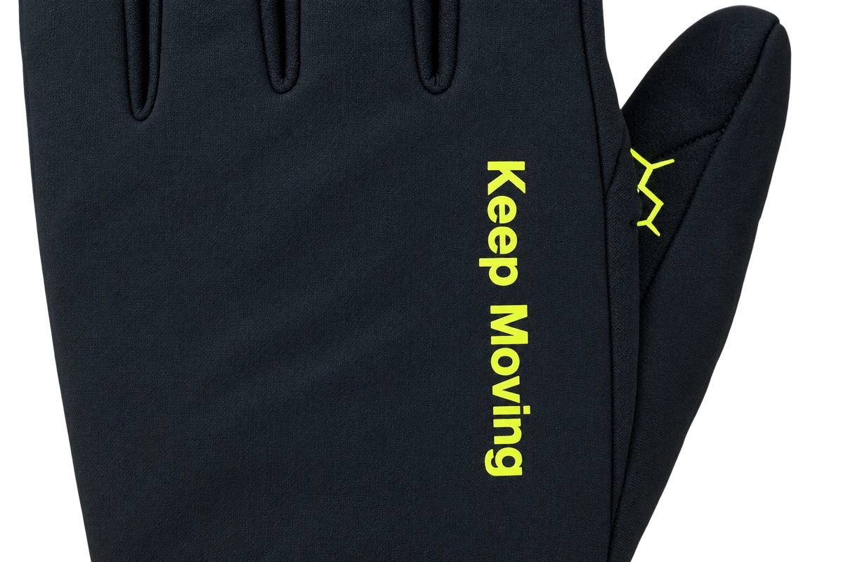Yellow Keep Moving lettering printed on a black glove back