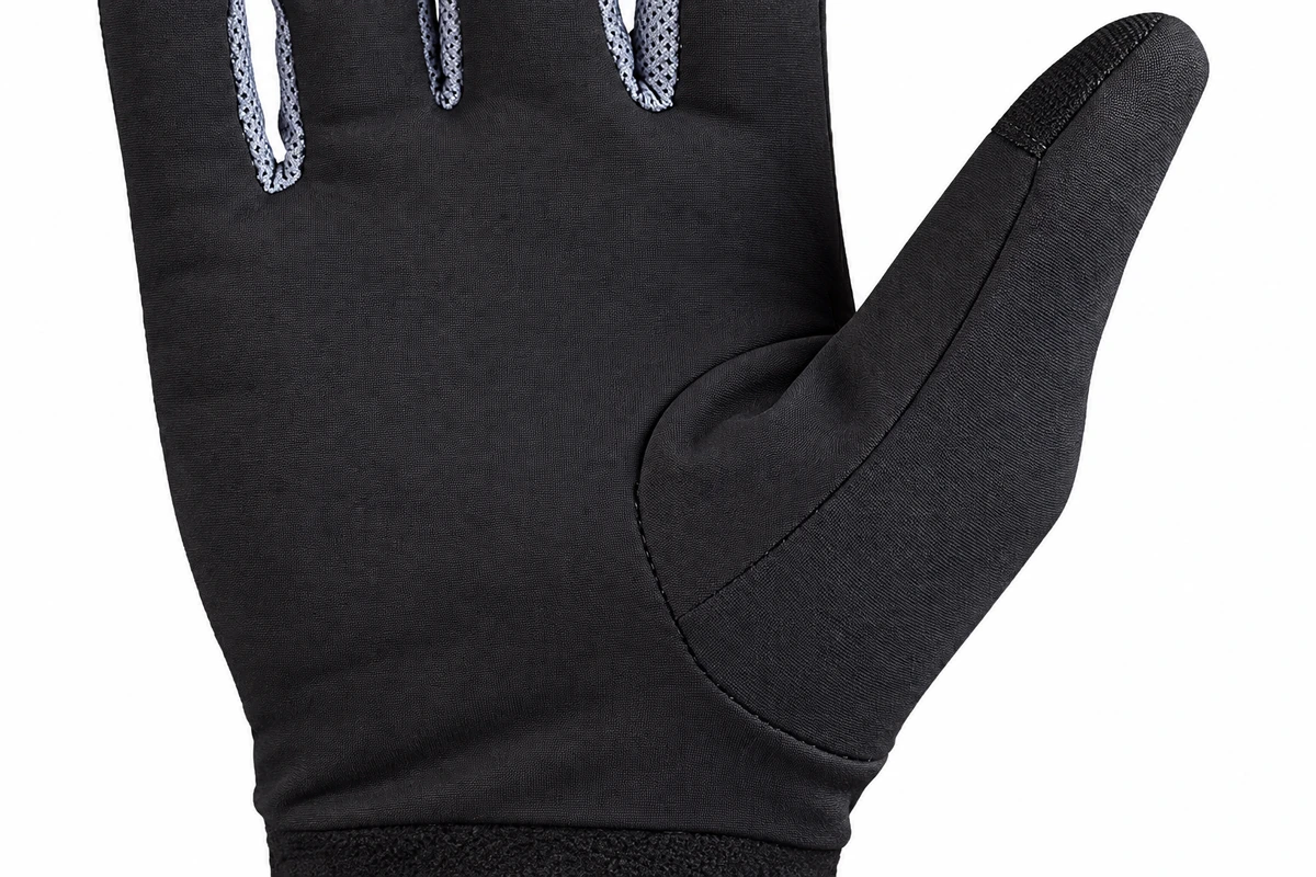 Palm surface and thumb contact area of a black glove
