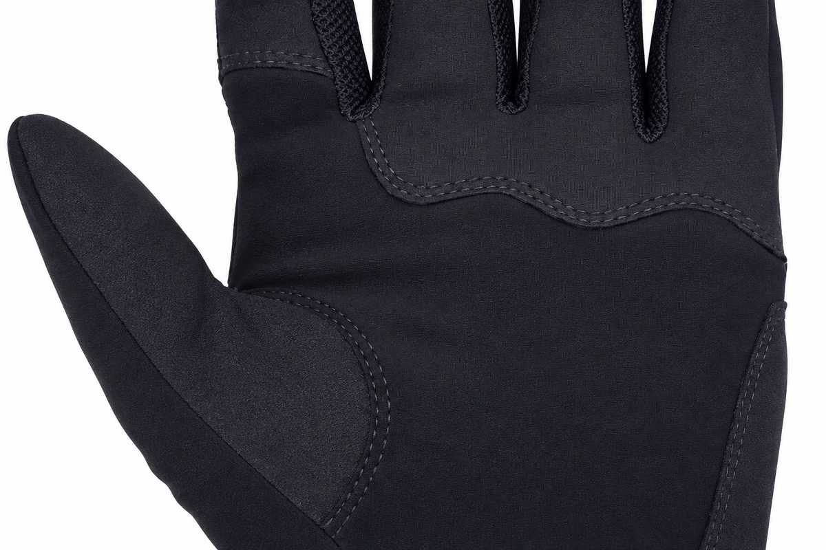 Sewn reinforcement panels on a black glove palm