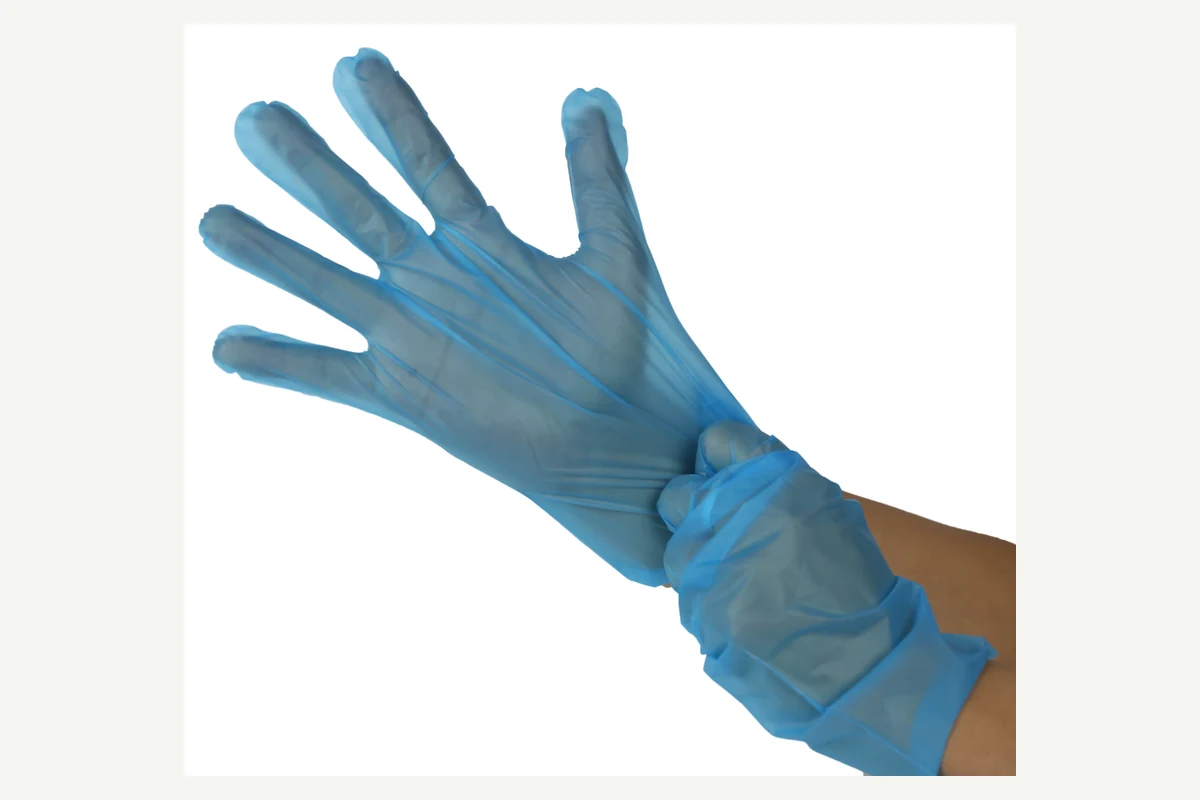 Blue latex disposable gloves showing wrist coverage