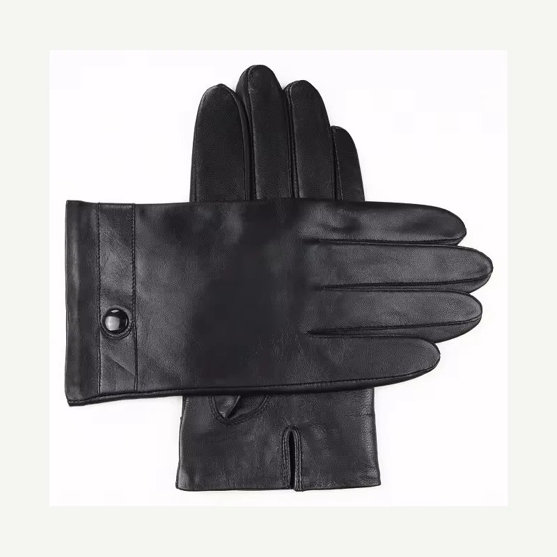 Black leather fashion gloves arranged with crossed cuffs