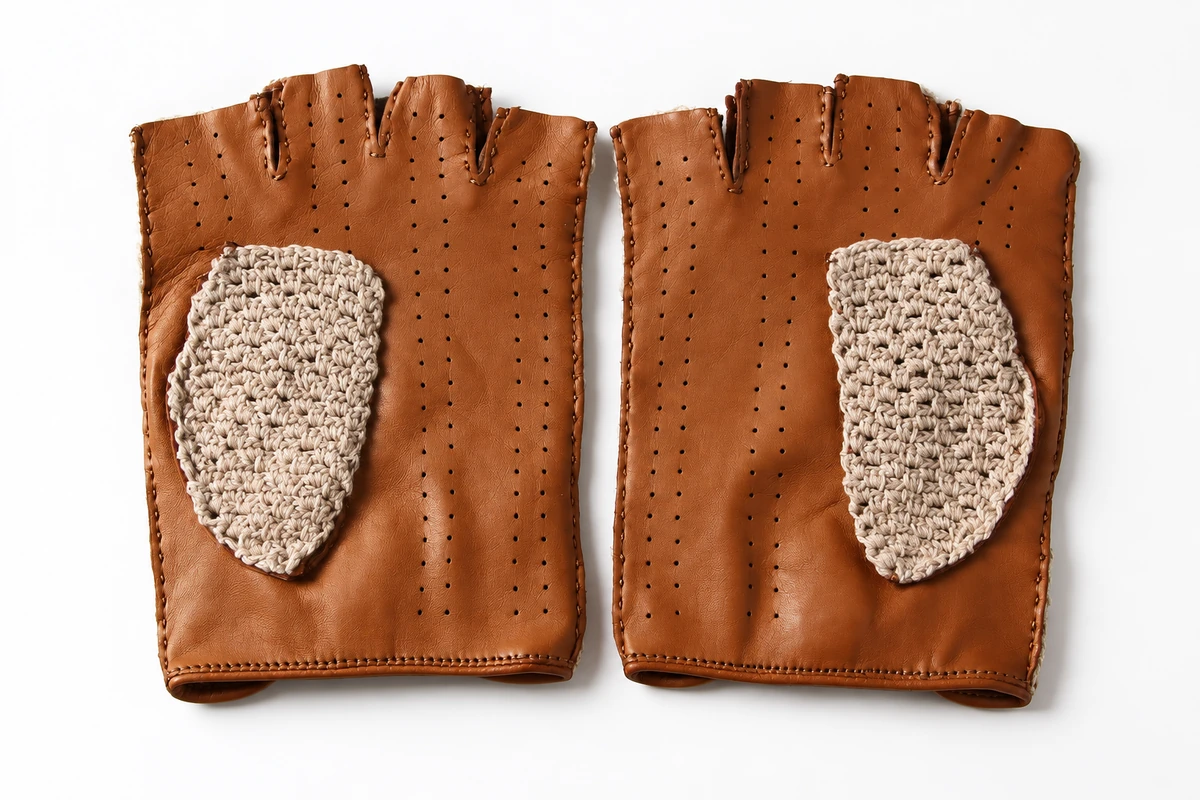 Fingerless tan leather gloves with beige crochet thumb panels