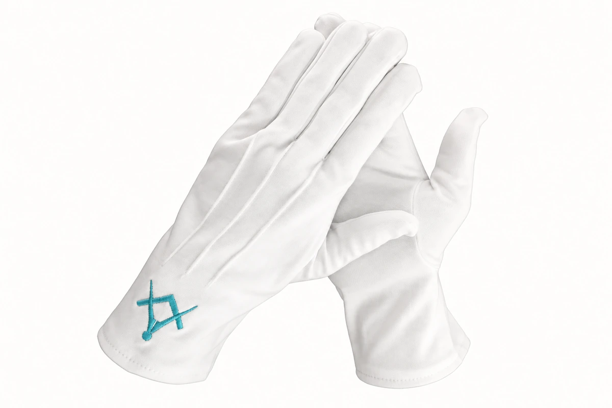 White fabric gloves with a turquoise embroidered cuff emblem