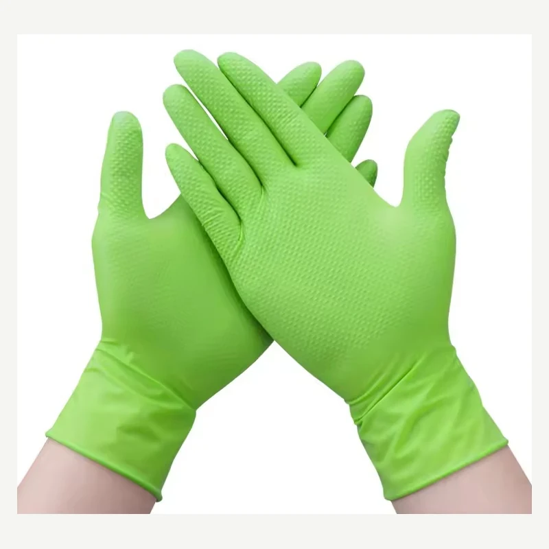 Green nitrile disposable gloves worn on both hands
