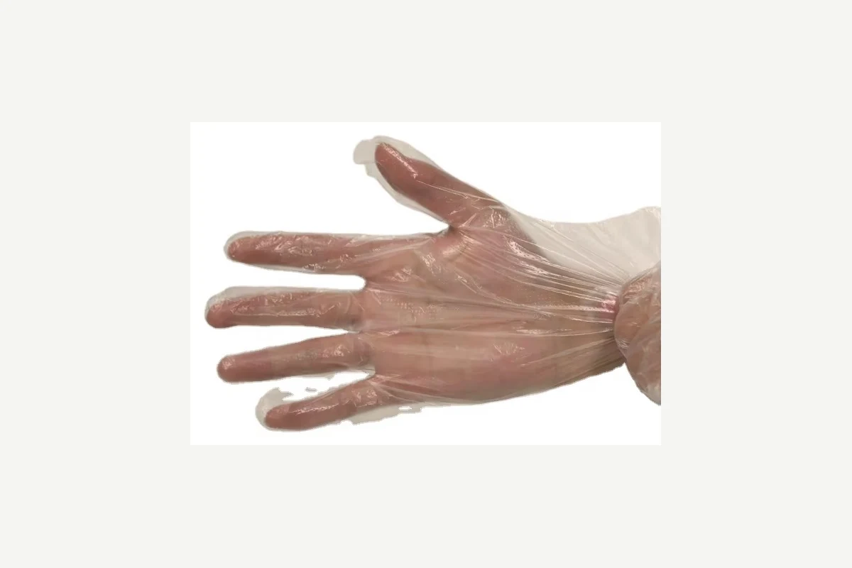 Clear disposable glove with an open palm and loose wrist folds