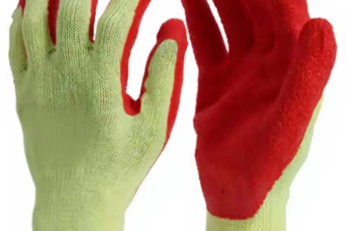Green knit gloves showing a red coated palm and a plain knitted back