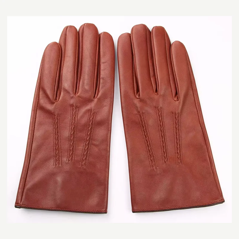 Rust leather fashion gloves displayed as a pair