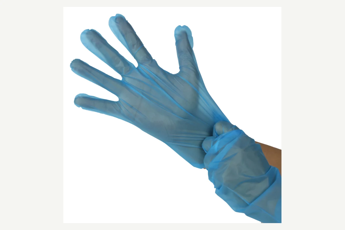 Loose blue film gloves worn on overlapping hands