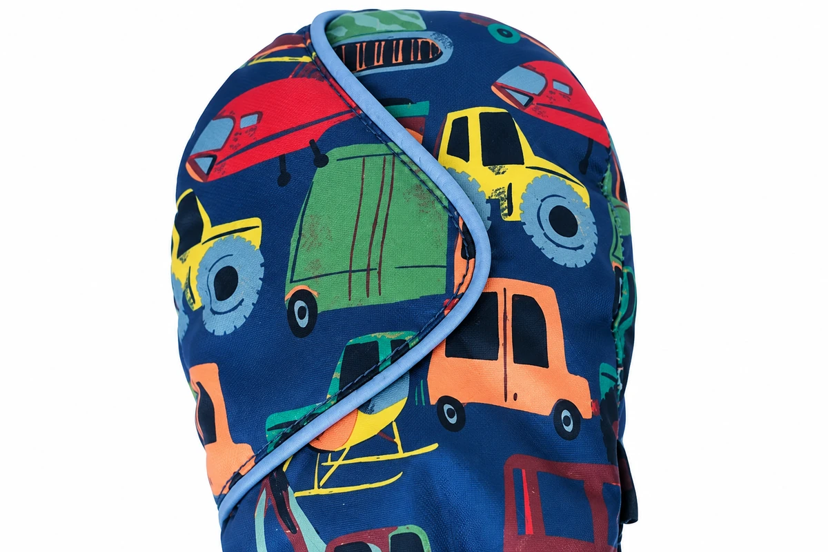 Colorful vehicle print on a navy winter mitten shell
