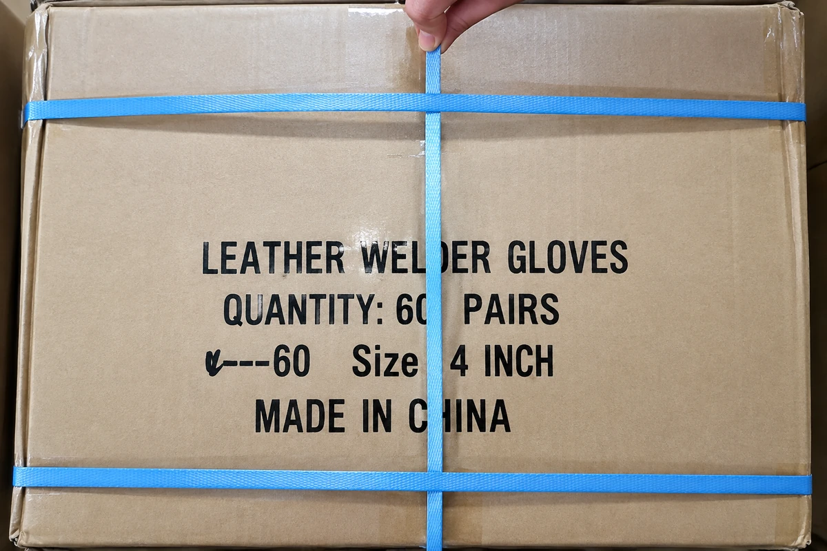 Strapped shipping carton marked for leather welding gloves
