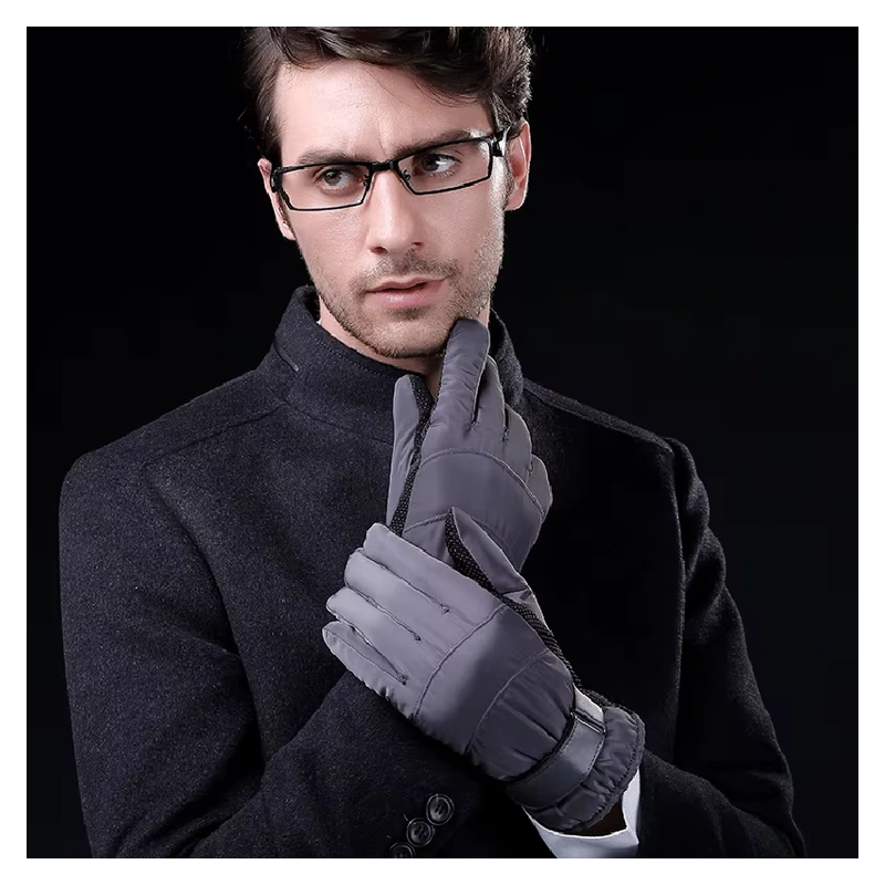 Gray full-finger gloves with wrist straps worn with a dark coat
