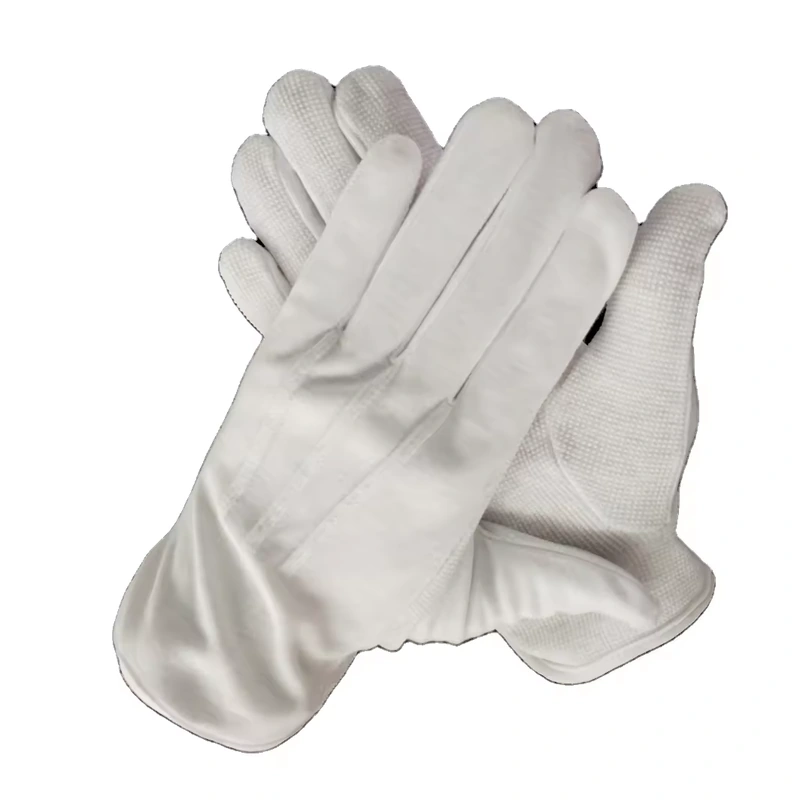 White fabric gloves crossed with stitched fingers and plain cuffs