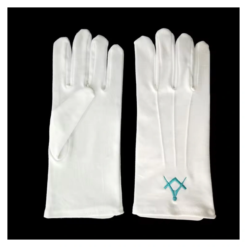 White gloves with a turquoise embroidered emblem on one cuff